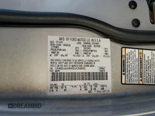 2002 Ford Explorer XLT z VIN 1FMDU63WX2UC00853, wystawiony jako Copart lot #87212814 z przebiegiem 235 622 mil mil oraz Szkoda całkowita • Salvage title. Historia ofert i sprzedaży dostępna na DreamBid. Obrazek 13.