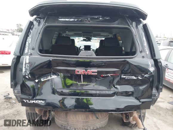 2015 GMC Yukon SLT with VIN 1GKS1BKC3FR129173, listed as a IAAI auction lot 41795585 with 97,893 mi miles. Bid and sale history available at carsss.com. Image 6.