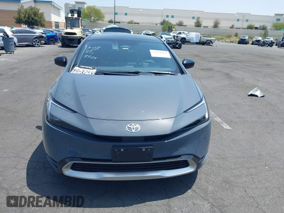 2024 Toyota Prius SE z VIN JTDACACU1R3033326, wystawiony jako IAAI lot #42174204 z przebiegiem 11 273 mil mil oraz . Historia ofert i sprzedaży dostępna na DreamBid. Obrazek 13.