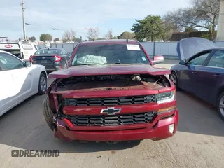 2016 Chevrolet Silverado 1500 LT with VIN 3GCPCREC4GG299107, listed as a IAAI auction lot 41770067 with 125,481 mi miles and . Bid and sale history available at DreamBid. Image 12.