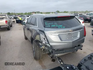 2021 Cadillac XT5 FWD Premium Luxury with VIN 1GYKNCRS5MZ128908, listed as a IAAI auction lot 41919571 with 51,280 mi miles and . Bid and sale history available at carsss.com. Image 3.