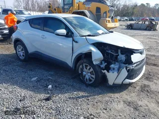2021 Toyota C-HR LE with VIN NMTKHMBX3MR133551, listed as a IAAI auction lot 41472613 with 50,995 mi miles. Bid and sale history available at carsss.com. Image 1.