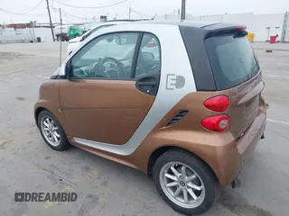 2015 Smart fortwo Passion with VIN WMEEJ9AA4FK831076, listed as a IAAI auction lot 42424797 with Not provided miles and . Bid and sale history available at DreamBid. Image 3.