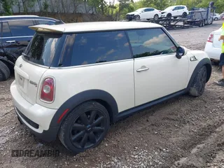 2010 MINI Hardtop S with VIN WMWMF7C55ATX44898, listed as a IAAI auction lot 42727762 with 131,845 mi miles and . Bid and sale history available at DreamBid. Image 4.