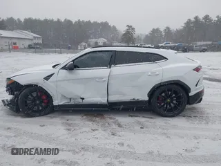 2019 Lamborghini Urus z VIN ZPBUA1ZL0KLA02164, wystawiony jako IAAI lot #41108311 z przebiegiem Nie podano mil oraz . Historia ofert i sprzedaży dostępna na DreamBid. Obrazek 14.
