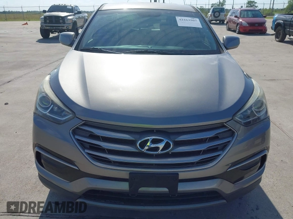 2017 Hyundai Santa Fe 2.4L z VIN 5XYZTDLB7HG444033, wystawiony jako IAAI lot #42263907 z przebiegiem 107 454 mil mil oraz . Historia ofert i sprzedaży dostępna na DreamBid. Obrazek 6.