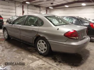 2006 Ford Taurus SE with VIN 1FAFP53U86A113947, listed as a IAAI auction lot 41753927 with 203,867 mi miles. Bid and sale history available at carsss.com. Image 3.