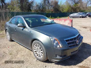 2011 Cadillac CTS z VIN 1G6DA5EY3B0121458, wystawiony jako IAAI lot #42052434 z przebiegiem 156 283 mil mil oraz . Historia ofert i sprzedaży dostępna na DreamBid. Obrazek 1.