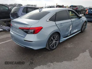 2022 Honda Civic Sedan Touring with VIN 2HGFE1F99NH306559, listed as a IAAI auction lot 41208480 with 18,956 mi miles. Bid and sale history available at carsss.com. Image 4.