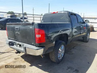 2013 Chevrolet Silverado 1500 LT with VIN 3GCPCSE05DG379301, listed as a IAAI auction lot 41866893 with 164,291 mi miles and . Bid and sale history available at DreamBid. Image 4.