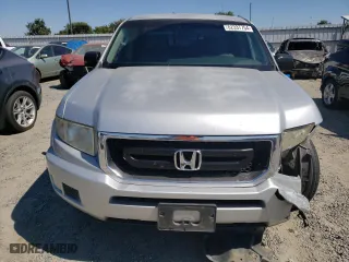 2009 Honda Ridgeline RT with VIN 2HJYK16259H502471, listed as a Copart auction lot 62337754 with 128,328 mi miles and Salvage Title. Bid and sale history available at carsss.com. Image 5.