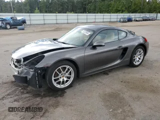 2015 Porsche Cayman with VIN WP0AA2A83FK162056, listed as a Copart auction lot 71223934 with 79,871 mi miles and Salvage Title. Bid and sale history available at DreamBid. Image 1.