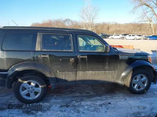 2007 Dodge Nitro SLT with VIN 1D8GU58K27W549214, listed as a IAAI auction lot 41358109 with 99,530 mi miles. Bid and sale history available at carsss.com. Image 13.
