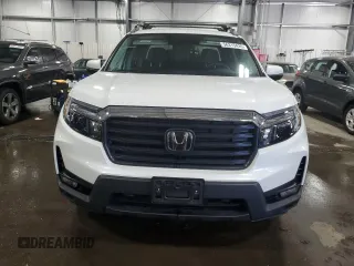 2023 Honda Ridgeline RTL with VIN 5FPYK3F56PB037672, listed as a Copart auction lot 56315435 with 26,550 mi miles and Salvage title. Bid and sale history available at DreamBid. Image 5.