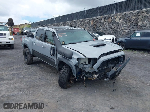 2018 Toyota Tacoma SR5 with VIN 3TMDZ5BN3JM039497, listed as a IAAI auction lot 42326823 with 92,977 mi miles and . Bid and sale history available at DreamBid. Image 6.