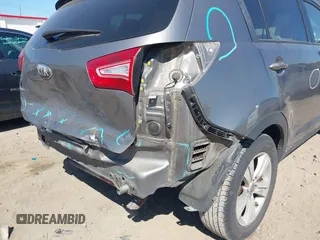 2013 Kia Sportage LX with VIN KNDPB3A21D7486860, listed as a IAAI auction lot 42049450 with 177,059 mi miles and . Bid and sale history available at DreamBid. Image 6.