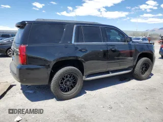 2015 Chevrolet Tahoe LT with VIN 1GNSCBKC6FR297726, listed as a Copart auction lot 55097475 with 114,471 mi miles and Salvage title. Bid and sale history available at DreamBid. Image 3.