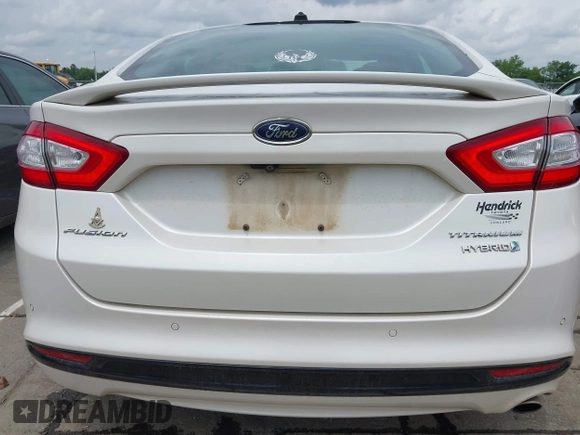 2016 Ford Fusion Titanium Hybrid with VIN 3FA6P0RU3GR190355, listed as a IAAI auction lot 42384309 with 157,172 mi miles and . Bid and sale history available at DreamBid. Image 16.