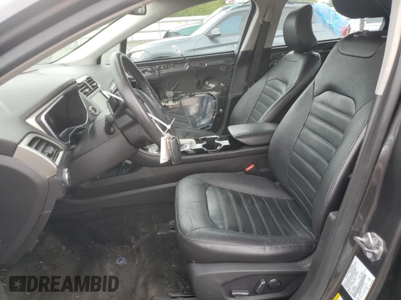 2015 Ford Fusion SE z VIN 3FA6P0H95FR206535, wystawiony jako Copart lot #54242105 z przebiegiem 83 001 mil mil oraz Szkoda całkowita • Salvage title. Historia ofert i sprzedaży dostępna na DreamBid. Obrazek 7.