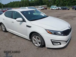 2015 Kia Optima LX z VIN KNAGM4A72F5627037, wystawiony jako IAAI lot #42399339 z przebiegiem 149 612 mil mil oraz . Historia ofert i sprzedaży dostępna na DreamBid. Obrazek 1.