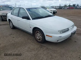 1999 Saturn SL with VIN 1G8ZK5279XZ290439, listed as a IAAI auction lot 41899736 with 154,348 mi miles. Bid and sale history available at carsss.com. Image 1.