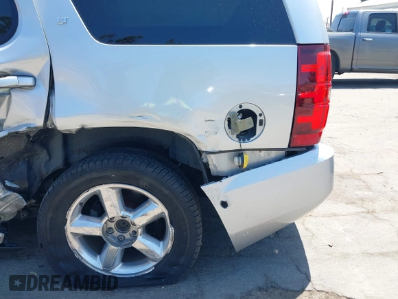 2012 Chevrolet Tahoe LT z VIN 1GNSCBE06CR255554, wystawiony jako IAAI lot #42544690 z przebiegiem 136 070 mil mil oraz . Historia ofert i sprzedaży dostępna na DreamBid. Obrazek 17.