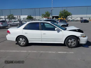 2001 Honda Accord EX z VIN 1HGCG16501A074615, wystawiony jako IAAI lot #42297708 z przebiegiem 187 936 mil mil oraz . Historia ofert i sprzedaży dostępna na DreamBid. Obrazek 13.