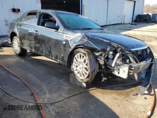 2009 Cadillac STS AWD with VIN 1G6DD67VX90137540, listed as a Copart auction lot 42062184 with 153,969 mi miles and Clean Title. Bid and sale history available at DreamBid. Image 4.