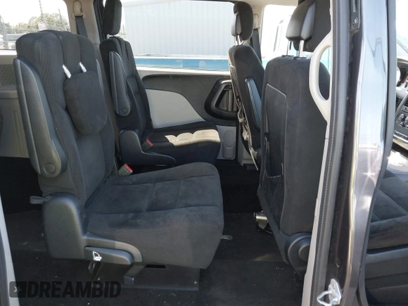 2016 Dodge Grand Caravan SXT with VIN 2C4RDGCG0GR333344, listed as a IAAI auction lot 41988558 with 79,454 mi miles and . Bid and sale history available at DreamBid. Image 8.