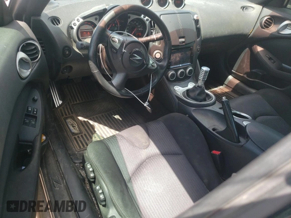 2009 Nissan 370Z Touring with VIN JN1AZ44E49M402605, listed as a Copart auction lot 55972355 with 157,066 mi miles and Clean Title. Bid and sale history available at DreamBid. Image 8.
