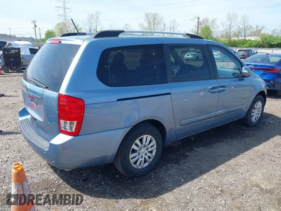 2011 Kia Sedona LX with VIN KNDMG4C74B6368551, listed as a IAAI auction lot 42022483 with 172,495 mi miles. Bid and sale history available at carsss.com. Image 4.
