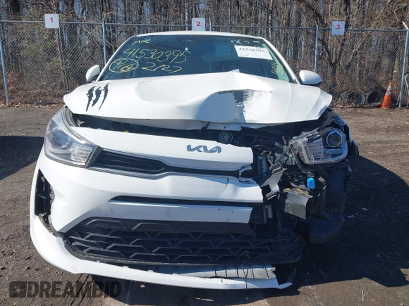 2022 Kia Rio S with VIN 3KPA25AD5NE458130, listed as a IAAI auction lot 41530395 with 33,154 mi miles and . Bid and sale history available at DreamBid. Image 13.