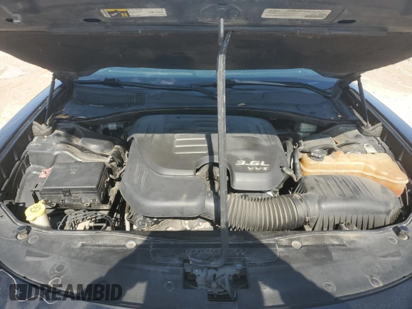 2015 Dodge Charger SXT with VIN 2C3CDXHGXFH896327, listed as a Copart auction lot 55931805 with 204,345 mi miles and Salvage Title. Bid and sale history available at DreamBid. Image 11.
