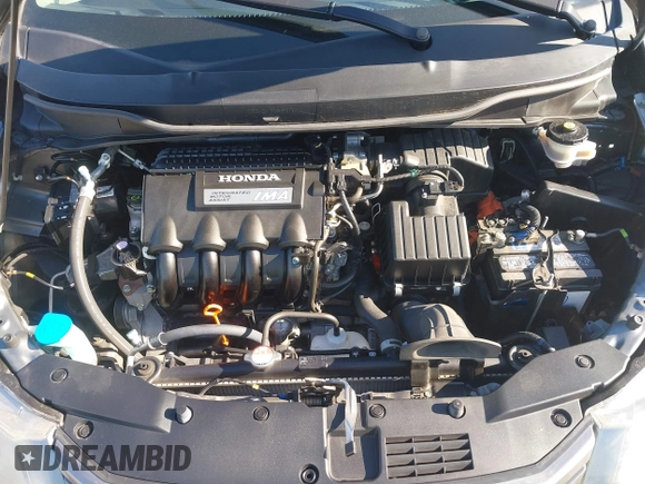2010 Honda Insight LX with VIN JHMZE2H50AS019740, listed as a IAAI auction lot 41665527 with 74,022 mi miles and . Bid and sale history available at DreamBid. Image 10.