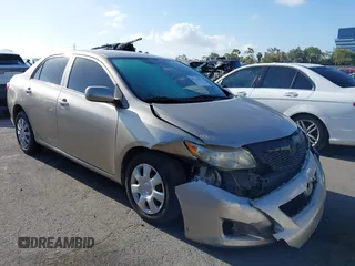 2009 Toyota Corolla with VIN 1NXBU40E09Z143600, listed as a IAAI auction lot 42141093 with 243,153 mi miles and . Bid and sale history available at DreamBid. Image 1.