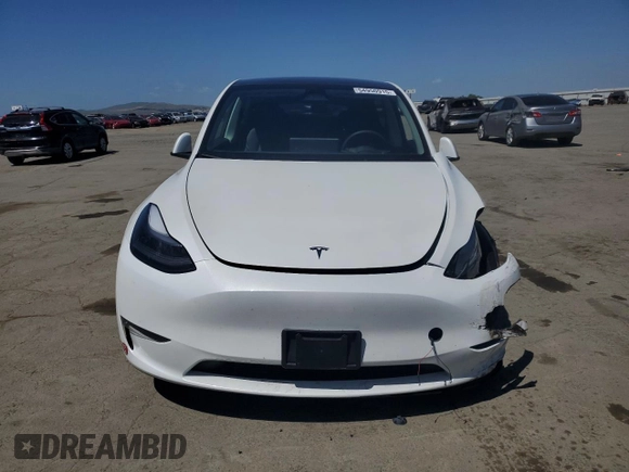 2024 Tesla Model Y Long Range с VIN 7SAYGDEE6RF157415, выставлен на аукционе Copart как лот 54950915 с пробегом 20 567 миль миль и Списание • Salvage title. История ставок и продаж доступна на DreamBid. Изображение 5.