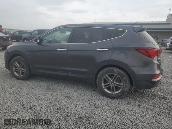 2018 Hyundai Santa Fe 2.4L with VIN 5XYZT3LB5JG561321, listed as a Copart auction lot 54839005 with 90,319 mi miles and Salvage title. Bid and sale history available at DreamBid. Image 2.
