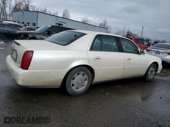 2002 Cadillac DeVille DHS z VIN 1G6KE57Y42U277428, wystawiony jako Copart lot #45757115 z przebiegiem 143 741 mil mil oraz Czysty tytuł • Clean title. Historia ofert i sprzedaży dostępna na DreamBid. Obrazek 3.