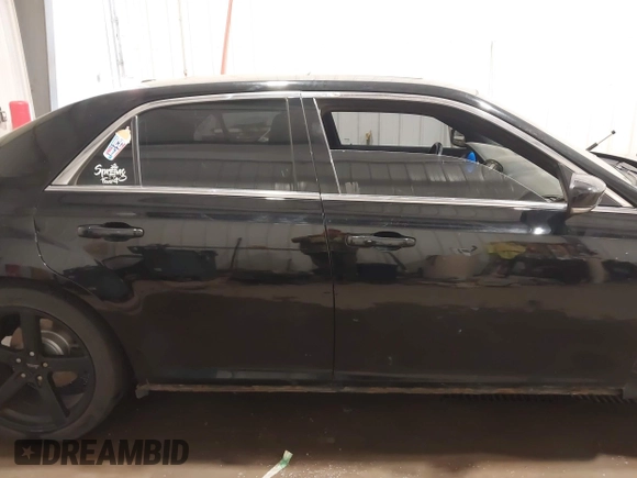 2012 Chrysler 300 S with VIN 2C3CCABG3CH272776, listed as a IAAI auction lot 40252319 with 155,701 mi miles and . Bid and sale history available at carsss.com. Image 13.