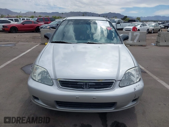 1999 Honda Civic LX with VIN JHMEJ6671XS003027, listed as a IAAI auction lot 41825146 with 197,764 mi miles and . Bid and sale history available at DreamBid. Image 12.