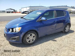 2014 Chevrolet Sonic LT with VIN 1G1JC6SB6E4120665, listed as a Copart auction lot 52042055 with 132,940 mi miles and Clean Title. Bid and sale history available at carsss.com. Image 1.