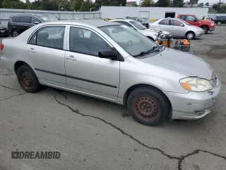 2003 Toyota Corolla CE with VIN JTDBR32E630047790, listed as a Copart auction lot 51277695 with 299,999 mi miles and Clean Title. Bid and sale history available at DreamBid. Image 4.