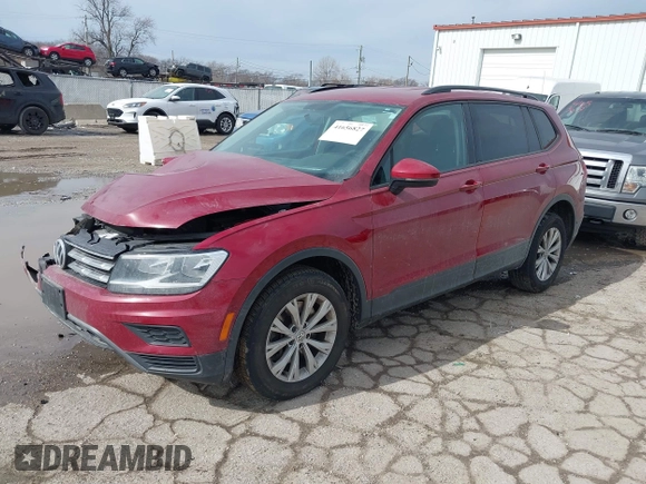 2018 Volkswagen Tiguan S with VIN 3VV1B7AX9JM085312, listed as a IAAI auction lot 41656827 with 122,322 mi miles and . Bid and sale history available at DreamBid. Image 17.