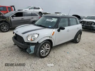 2013 MINI Countryman with VIN WMWZB3C5XDWM31620, listed as a Copart auction lot 51096035 with 93,928 mi miles and Salvage title. Bid and sale history available at DreamBid. Image 1.