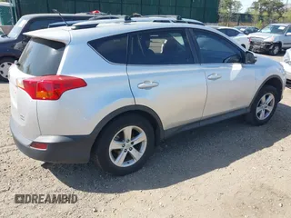 2013 Toyota RAV4 XLE with VIN 2T3RFREV4DW091452, listed as a IAAI auction lot 42165992 with 107,947 mi miles and . Bid and sale history available at carsss.com. Image 4.