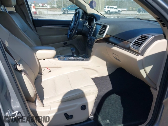 2014 Jeep Grand Cherokee Limited with VIN 1C4RJFBG5EC588971, listed as a IAAI auction lot 41971004 with 154,122 mi miles and . Bid and sale history available at DreamBid. Image 5.