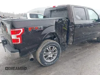 2019 Ford F-150 XL with VIN 1FTFW1E13KFC63843, listed as a IAAI auction lot 41682862 with 102,390 mi miles. Bid and sale history available at carsss.com. Image 6.