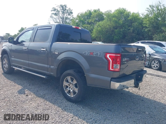 2015 Ford F-150 XLT with VIN 1FTEW1EG1FFB89473, listed as a IAAI auction lot 42590072 with 142,614 mi miles and . Bid and sale history available at DreamBid. Image 3.