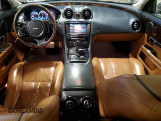 2014 Jaguar XJ Portfolio with VIN SAJWJ2GD7E8V67473, listed as a Copart auction lot 43968705 with 99,146 mi miles and Salvage title. Bid and sale history available at DreamBid. Image 8.