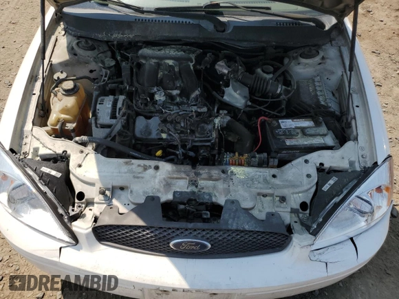 2005 Ford Taurus SE z VIN 1FAHP53U65A184099, wystawiony jako Copart lot #60960015 z przebiegiem Nie podano mil oraz Szkoda całkowita • Salvage title. Historia ofert i sprzedaży dostępna na DreamBid. Obrazek 11.